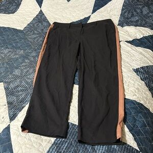 Wild and black pants with brown stripes on the side